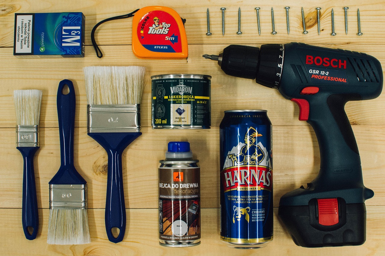 Tradesperson carefully applying paint during a home renovation and decorating project